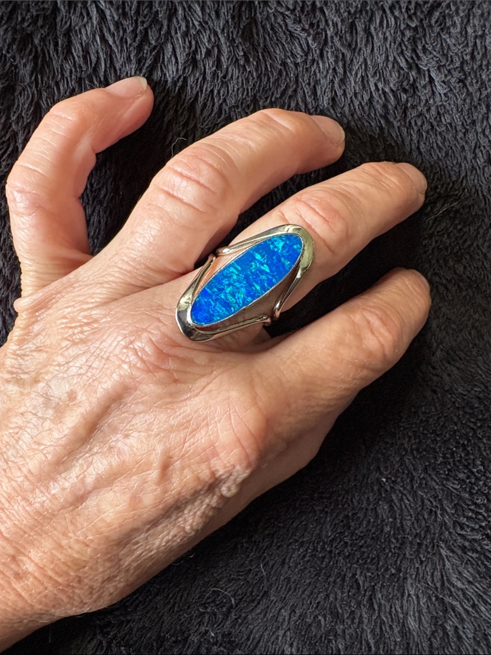 Sterling Silver Large Blue (Oval) Opal Cocktail Ring. 
Quality Artisan Jeweller.